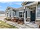 Close-up of the home's entrance, showcasing the front door, sidelights, and brick foundation at 3919 Shelleydale Dr, Powder Springs, GA 30127