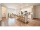 Staged kitchen showcasing a breakfast bar, stainless appliances, and adjacent dining area at 3919 Shelleydale Dr, Powder Springs, GA 30127