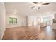 Hardwood floors, natural light from windows, and access to kitchen and backyard at 3919 Shelleydale Dr, Powder Springs, GA 30127