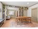 Charming dining room features built-in bookcases, hardwood floors and an elegant area rug at 574 Chicasaw Ne Dr, Marietta, GA 30060