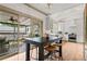 Bright, updated kitchen with a large island, modern appliances, and sliding glass doors to the outdoor deck at 574 Chicasaw Ne Dr, Marietta, GA 30060