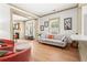 Cozy living room with hardwood floors, neutral decor, and ample natural light at 574 Chicasaw Ne Dr, Marietta, GA 30060