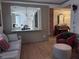 Cozy living room with hardwood floors and view of the kitchen at 574 Chicasaw Ne Dr, Marietta, GA 30060