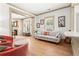 Inviting living room featuring modern furniture, hardwood floors, and a cozy atmosphere at 574 Chicasaw Ne Dr, Marietta, GA 30060