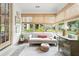 Cozy sun room with lots of light and a beautiful view of the backyard at 574 Chicasaw Ne Dr, Marietta, GA 30060