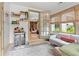 Bright sun room featuring lots of windows, natural light and access to the backyard at 574 Chicasaw Ne Dr, Marietta, GA 30060