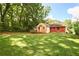 Exterior backyard of the property and wooded area surrounding the property at 2054 Fargo Se Pl, Atlanta, GA 30316
