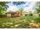 Wide view of the backyard and wooden deck attached to the house at 2054 Fargo Se Pl, Atlanta, GA 30316