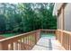 Back deck overlooks fenced backyard with above ground pool and mature trees at 3112 Calumet Nw Cir, Kennesaw, GA 30152