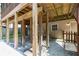 View of backyard patio showing the home's foundation support system at 3112 Calumet Nw Cir, Kennesaw, GA 30152