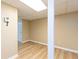 Finished basement space features neutral paint and wood-look laminate flooring at 3112 Calumet Nw Cir, Kennesaw, GA 30152