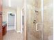 Spacious bathroom featuring walk-in shower with tile surround and glass door at 3112 Calumet Nw Cir, Kennesaw, GA 30152