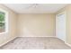 Cozy bedroom featuring neutral walls, carpet, ceiling fan, and closet at 3112 Calumet Nw Cir, Kennesaw, GA 30152