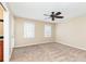 Neutral bedroom with ceiling fan, and carpet flooring, offering a calming and comfortable retreat at 3112 Calumet Nw Cir, Kennesaw, GA 30152