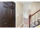 Inviting entryway with hardwood floors, staircase, and view into the living room at 3112 Calumet Nw Cir, Kennesaw, GA 30152