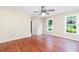 Bright living room features hardwood floors, neutral walls, and an updated ceiling fan at 3112 Calumet Nw Cir, Kennesaw, GA 30152