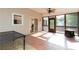 Screened-in porch with tile flooring leads to backyard and home's interior at 3112 Calumet Nw Cir, Kennesaw, GA 30152