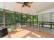 Spacious screened-in porch with wooded views, perfect for outdoor living at 3112 Calumet Nw Cir, Kennesaw, GA 30152