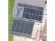Aerial view of a home featuring multiple solar panels on the roof and over the patio at 3112 Calumet Nw Cir, Kennesaw, GA 30152
