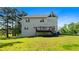 Large backyard with a spacious deck perfect for outdoor entertaining at 405 Branch Forest Way, Stockbridge, GA 30281
