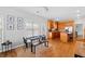 Eat-in kitchen features updated appliances and an adjacent dining space with natural light at 405 Branch Forest Way, Stockbridge, GA 30281