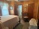 Cozy bedroom with natural light, comfortable bed, and rocking chair at 871 Malcom Se St, Conyers, GA 30012