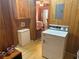Laundry room featuring a dryer and a storage area at 871 Malcom Se St, Conyers, GA 30012