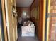 Cozy living room with floral sofa and classic wood paneling at 871 Malcom Se St, Conyers, GA 30012
