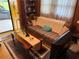 A cozy living room features a plaid couch and wooden coffee table with a television at 871 Malcom Se St, Conyers, GA 30012