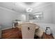 Stylish dining area with a round table, hardwood floors, and a view into the living space at 1630 Marsanne Nw Ter # 27, Kennesaw, GA 30152