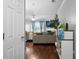 Elegant living room with hardwood floors, stylish furnishings, and plenty of natural light at 1630 Marsanne Nw Ter # 27, Kennesaw, GA 30152