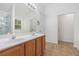 Bathroom with double vanity, neutral walls, and tile floor at 4139 Magnolia Glen Walk, Norcross, GA 30093