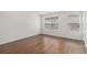 Bright bedroom with natural light, featuring wood flooring and spacious layout at 4139 Magnolia Glen Walk, Norcross, GA 30093