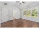 Bedroom with vaulted ceiling, hardwood floors, and ensuite bath at 4139 Magnolia Glen Walk, Norcross, GA 30093