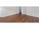 Bedroom with wood flooring and neutral walls, providing a blank slate for personalization at 4139 Magnolia Glen Walk, Norcross, GA 30093