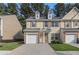 Charming townhouse with a single-car garage and meticulously maintained lawn at 4139 Magnolia Glen Walk, Norcross, GA 30093