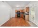 Well-equipped kitchen with modern appliances, wood cabinets, and seamless access to dining area at 4139 Magnolia Glen Walk, Norcross, GA 30093