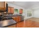 Open kitchen with counter seating and modern appliances, perfect for quick meals or entertaining at 4139 Magnolia Glen Walk, Norcross, GA 30093