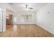 Bright living area with large windows that overlook backyard, and access to open kitchen at 4139 Magnolia Glen Walk, Norcross, GA 30093