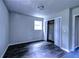 Cozy bedroom with neutral walls, closet and vinyl flooring for a clean and modern look at 5904 Heatherwood Ln, Riverdale, GA 30296
