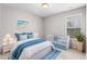 Calming bedroom featuring a bed and a crib, accented with blue decor at 867 Crested Hawk Trl, Sugar Hill, GA 30518