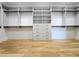 Custom closet featuring adjustable shelves, drawers, and hanging rods providing generous storage solutions at 1197 Avondale Se Ave, Atlanta, GA 30312