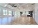 Bright, open floor plan with hardwood floors connecting the living and kitchen areas at 1197 Avondale Se Ave, Atlanta, GA 30312