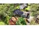 Aerial view of a home surrounded by mature trees and lush landscaping at 1280 Sherry Dr, Alpharetta, GA 30009