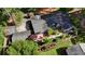 Aerial view of a home with a fenced backyard, patio area, and lush landscaping at 1280 Sherry Dr, Alpharetta, GA 30009