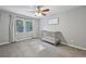 Bedroom bedroom with neutral walls, window and gray baby crib, plus calming décor at 1280 Sherry Dr, Alpharetta, GA 30009