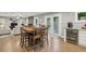 Open floor plan from dining area to the living room and bar area at 1280 Sherry Dr, Alpharetta, GA 30009