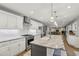 Gourmet kitchen with stainless steel appliances, granite countertops, and large island with sink at 1280 Sherry Dr, Alpharetta, GA 30009
