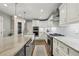 Lovely open kitchen with a long island, granite countertops, and stainless steel appliances at 1280 Sherry Dr, Alpharetta, GA 30009
