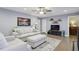 Comfortable living room with hardwood floors, area rug, and large picture window at 1280 Sherry Dr, Alpharetta, GA 30009